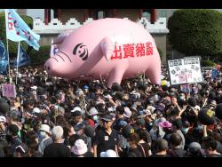 Thousands march against US pork imports | World News – Jamaica Gleaner